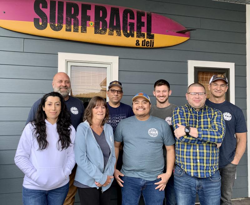 SoDel Concepts announced its leadership team at Surf Bagel, which the hospitality group purchased Dec. 6. Leadership team members for the Surf Bagel brand shown in back are (l-r) DJ Forcucci, administrative director; Guillermo Montalvo, assistant manager; Johnny Sapienza, general manager; and John Sapienza, corporate chef. In front are Enid Gutierrez, general manager; Wendy DiGuglielmo, assistant manager; Emmi Lux, assistant manager; and Wes Books, director of operations. SUBMITTED PHOTO